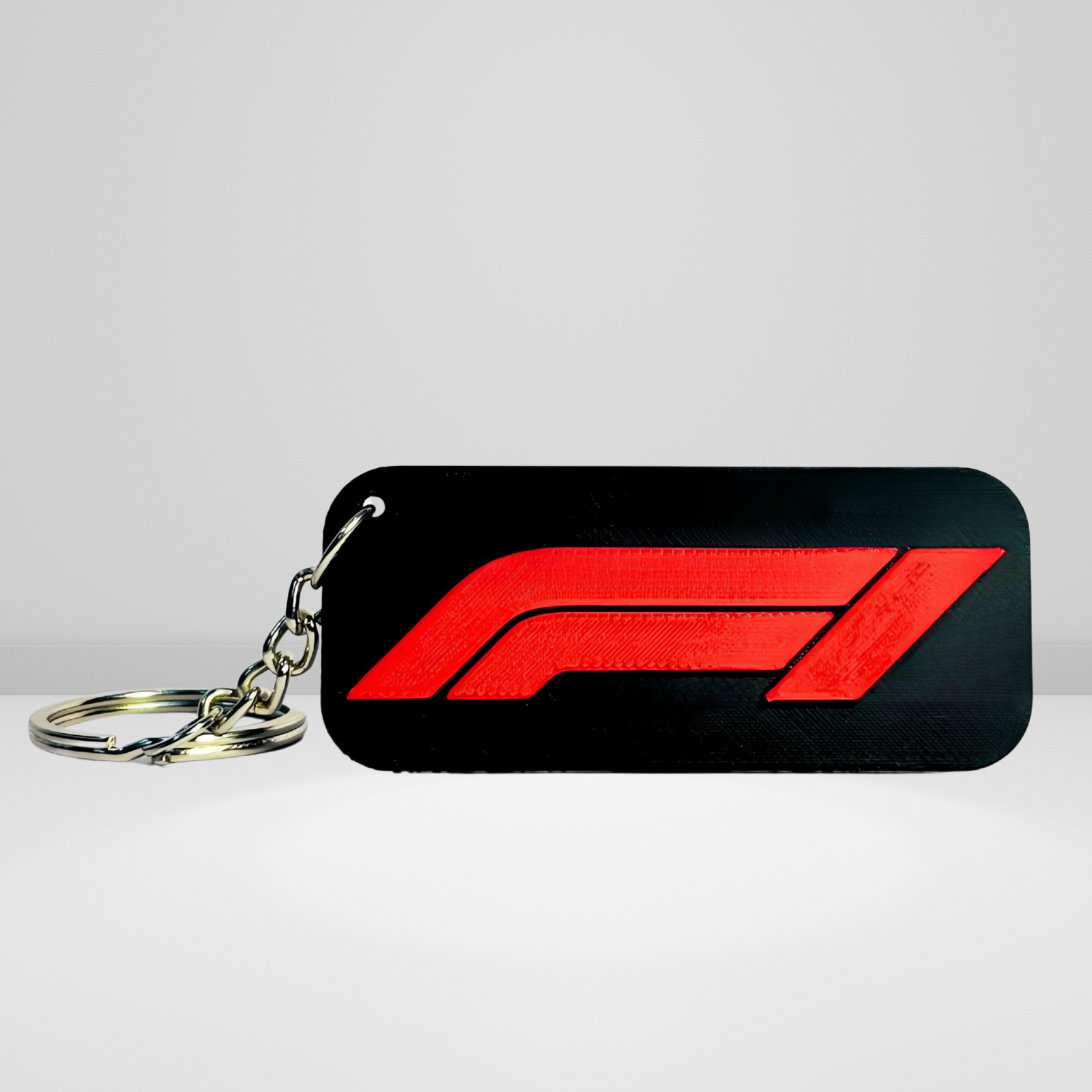 Authentic F1 car silhouette keyring – durable PLA material