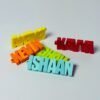 Personalized name keychain in multiple vibrant colors – customizable keyring accessory for gifts and everyday use.