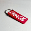 Coca-Cola keychain with classic Coke logo design