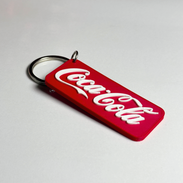 Coca-Cola keychain with classic Coke logo design