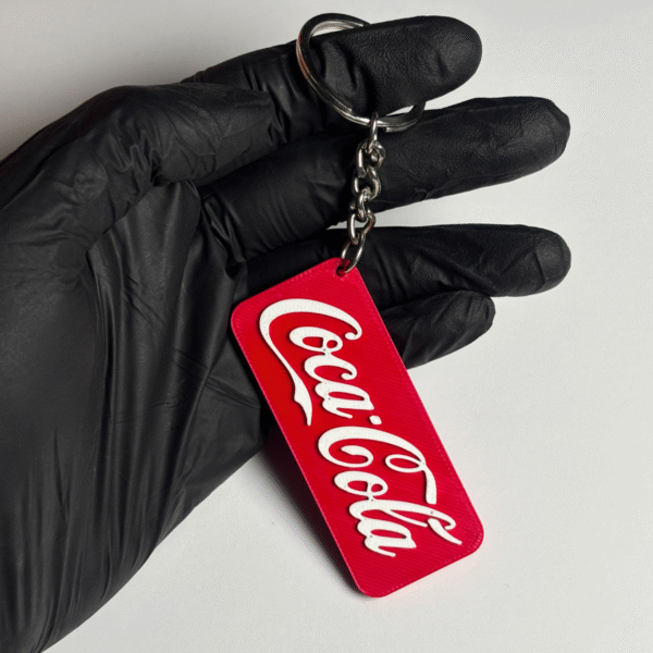 Coca-Cola keychain with classic Coke logo design